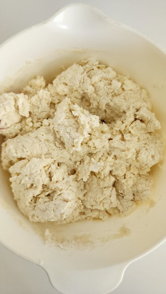 buttermilk and flour made to a shaggy dough for buttermilk biscuits