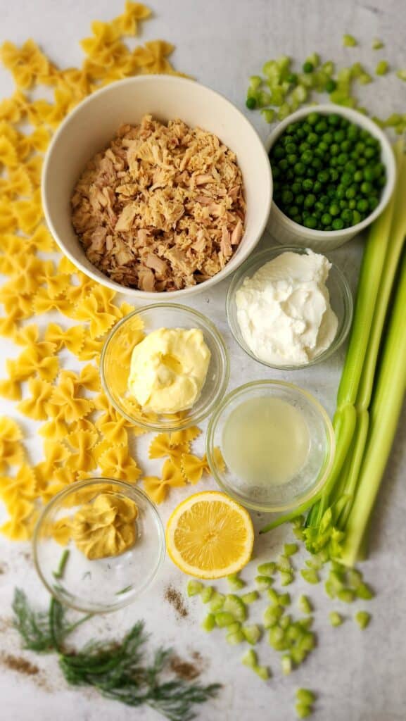 Tuna Pasta Salad - Ingredients:  Tuna, Dry Pasta, Celery, Dill, Mayonnaise, Greek Yogurt, Lemon, Dijon Mustard