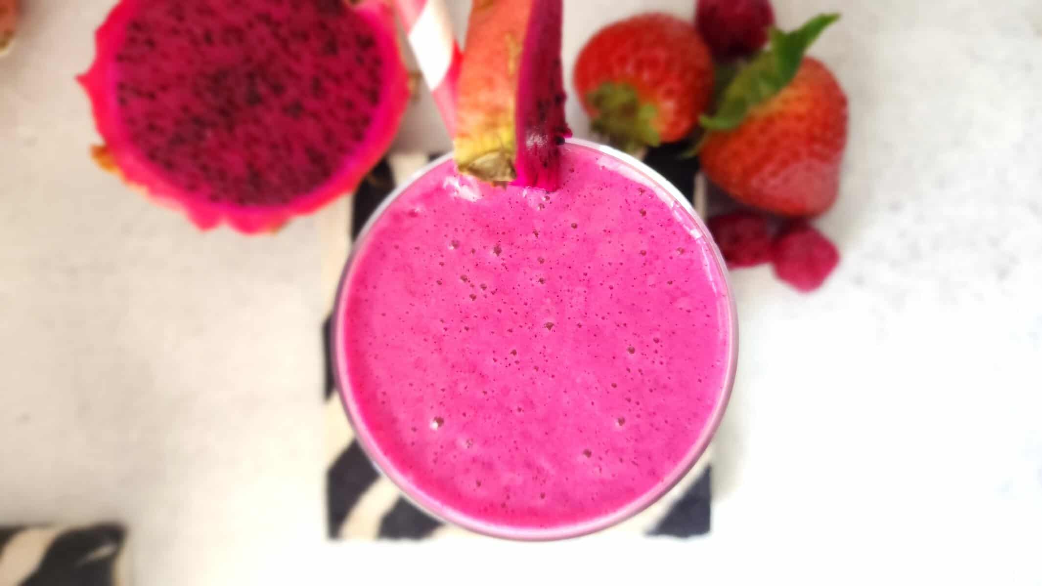 Top shot of a dragon fruit smoothie - hot pink in color