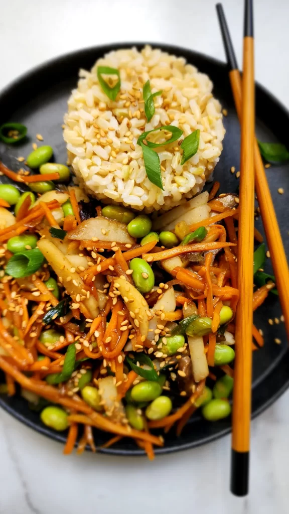 plate of stir-fried veggies with brown rice