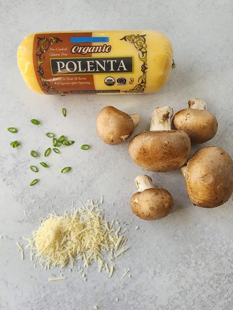 ingredients for mushroom polenta bites: polenta, parmesan cheese, scallions, mushrooms