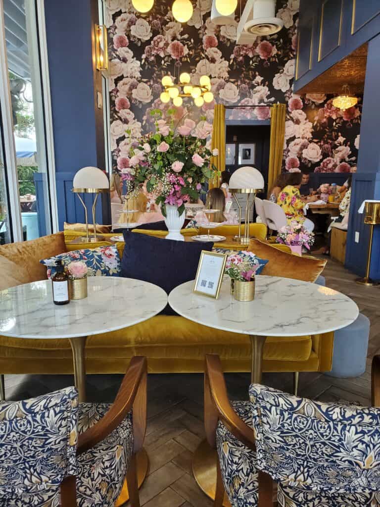 inside the Little Hen restaurant, table with flowers